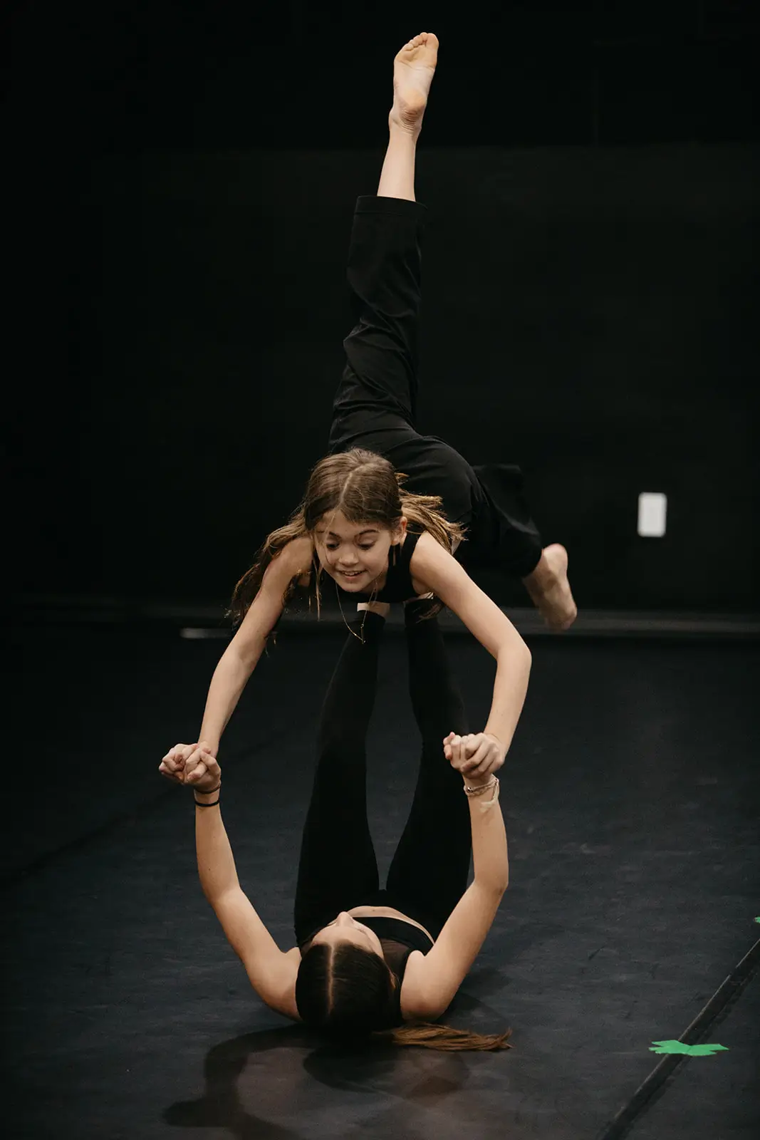 Dancers in all black